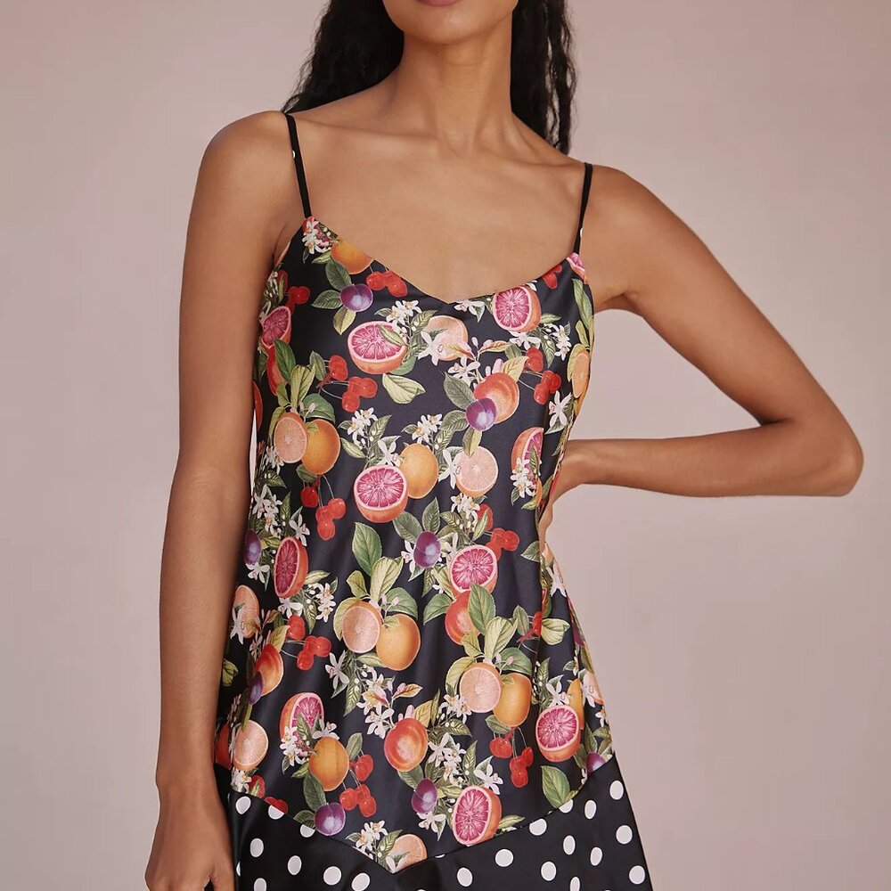 Show Me Your MuMu Uptown Tie Mini Dress in a black fruit and polka dot print
